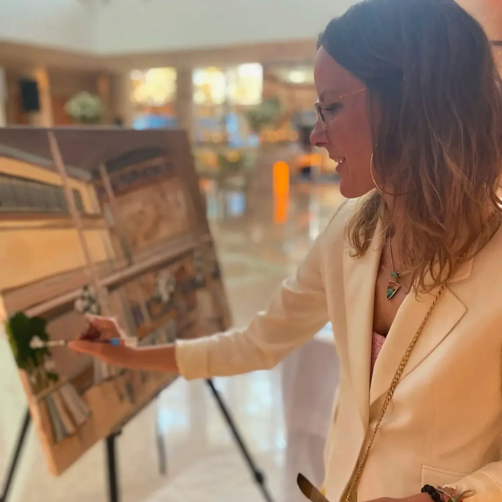 Adelle Marcero painting live at a wedding event